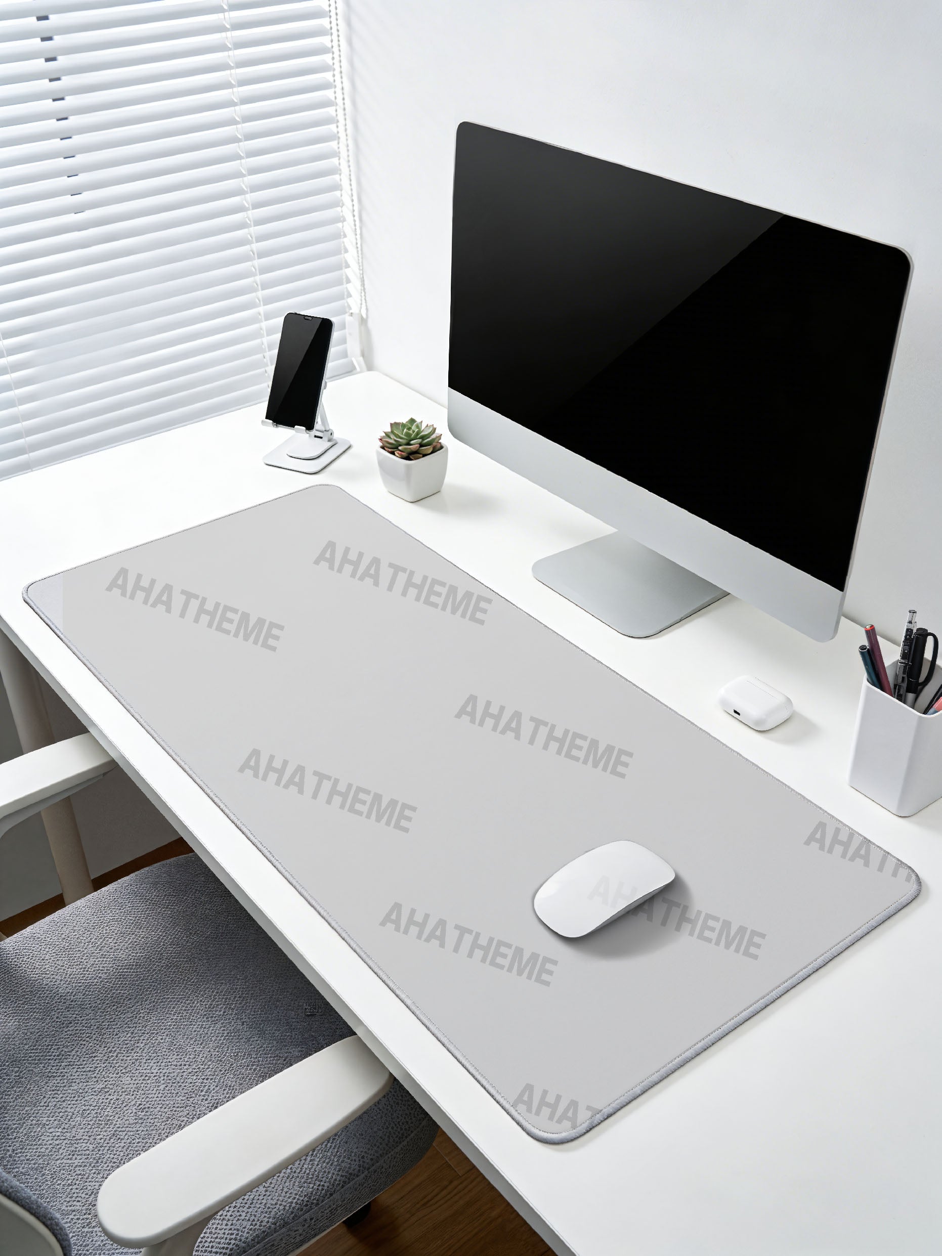 Large light gray custom mousepad on desk with computer, styled for streetwear and alternative fashion fans.